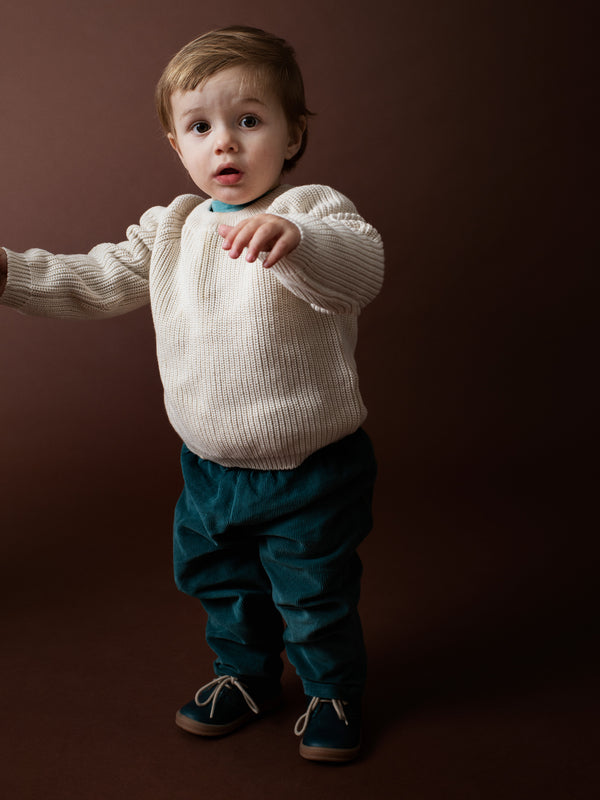 PATENT SWEATER