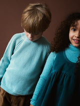 PATENT SWEATER